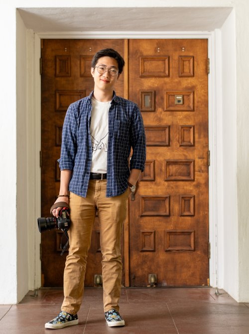 Richard Trinh holding a camera