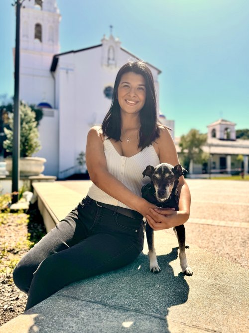 Olivia Luna on campus with her dog
