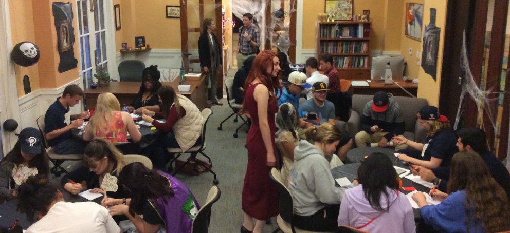 The Writing Center on Halloween, filled with students in Writing Circles and Sessions.