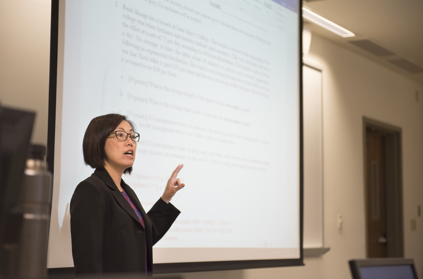 A professor is giving a lecture