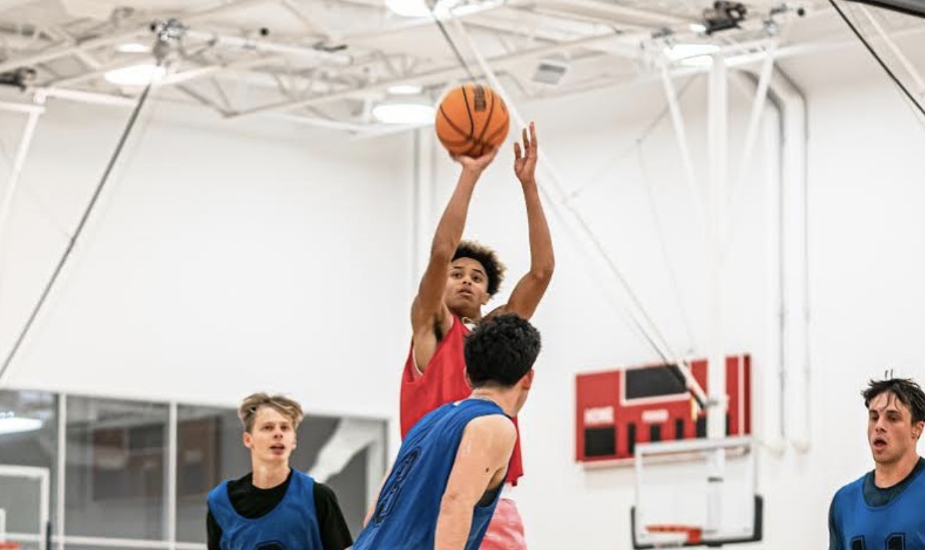 A basketball player taking a shot