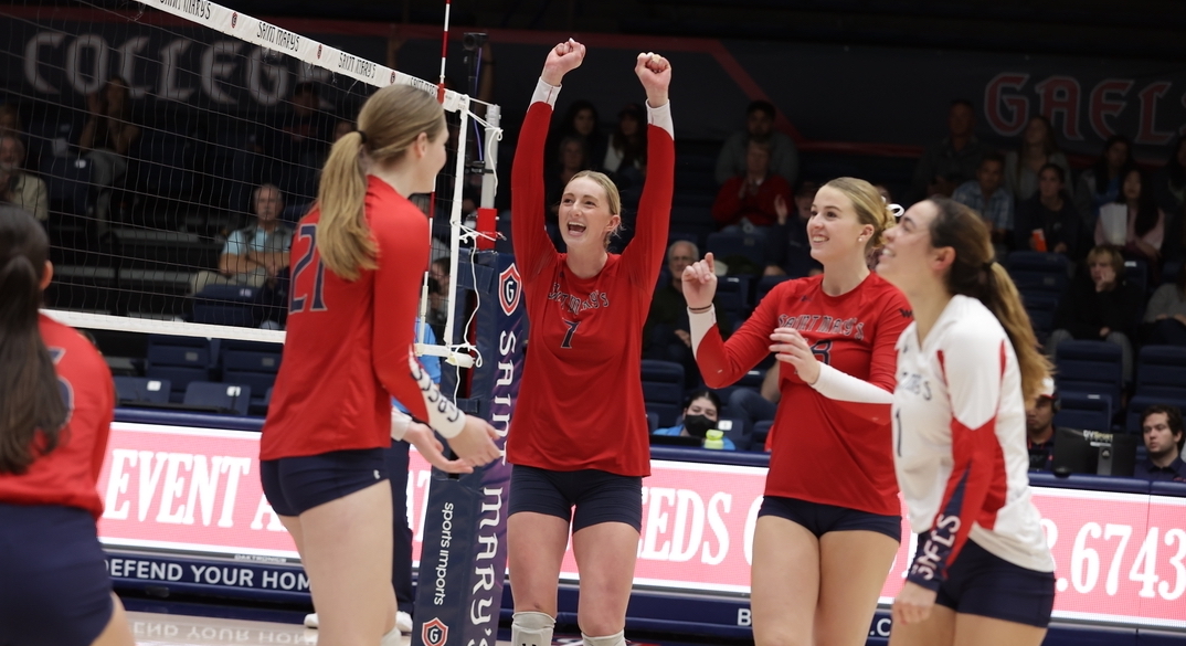 Saint Mary's volleyball players cheering