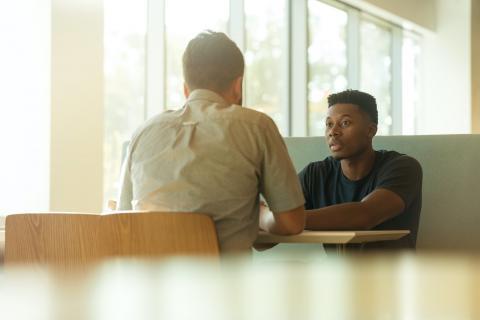 A meeting between a student and teacher