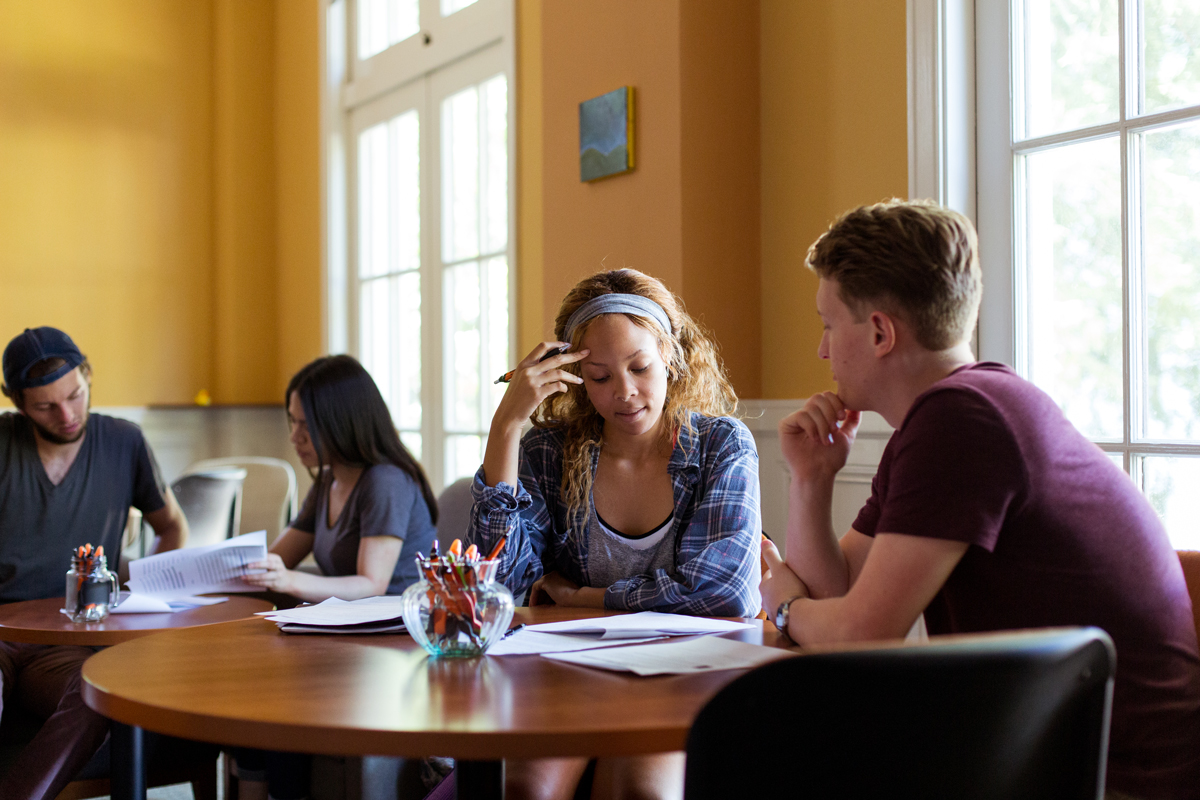 Students studying together in the writing center