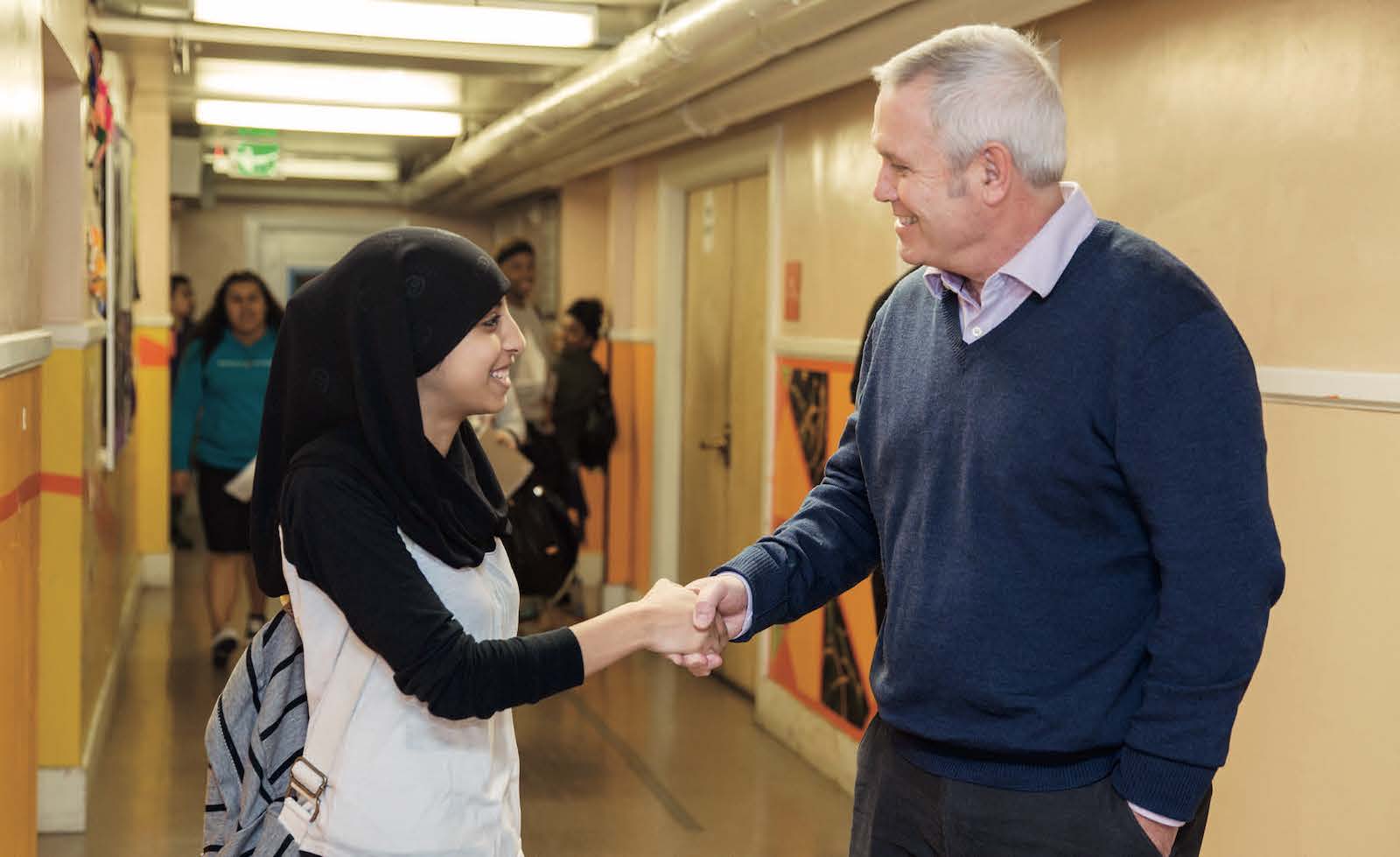 Female student with Bob Lenz of Envision Education