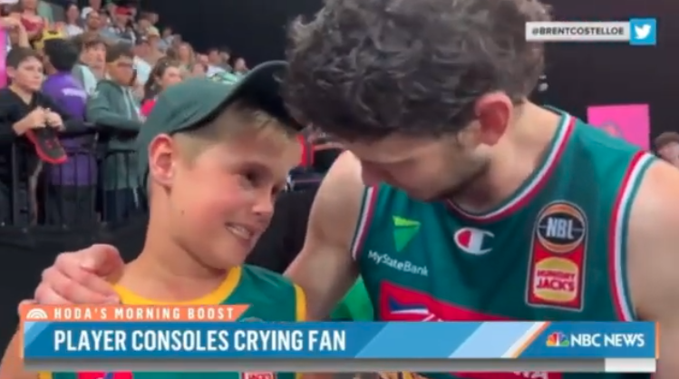 Saint Mary's alum Clint Steindl consoles a young fan after Steindl's Tasmania JackJumpers lost in the NBL semifinals.