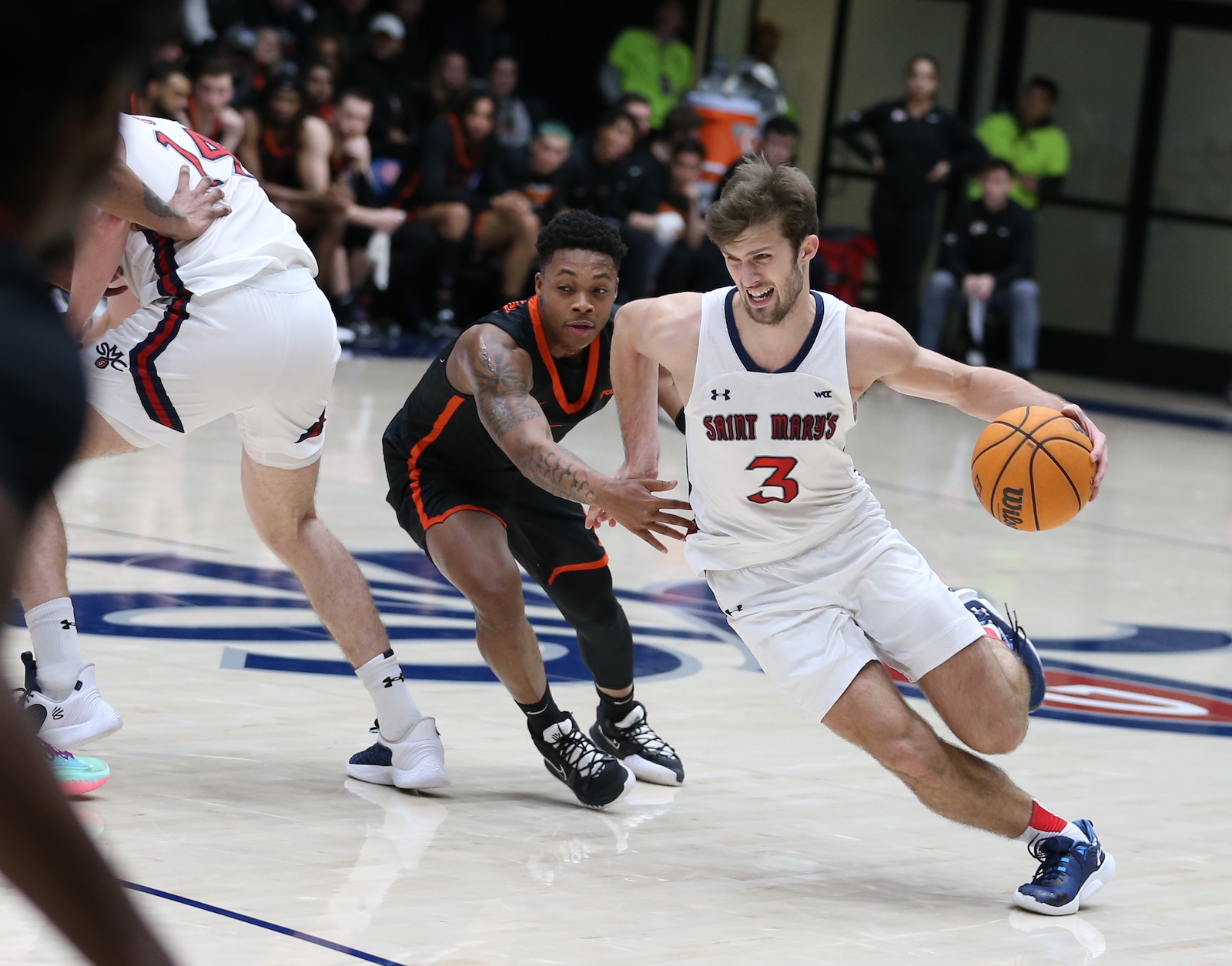 Basketball player Augustas Marciulionis drives against Pacific