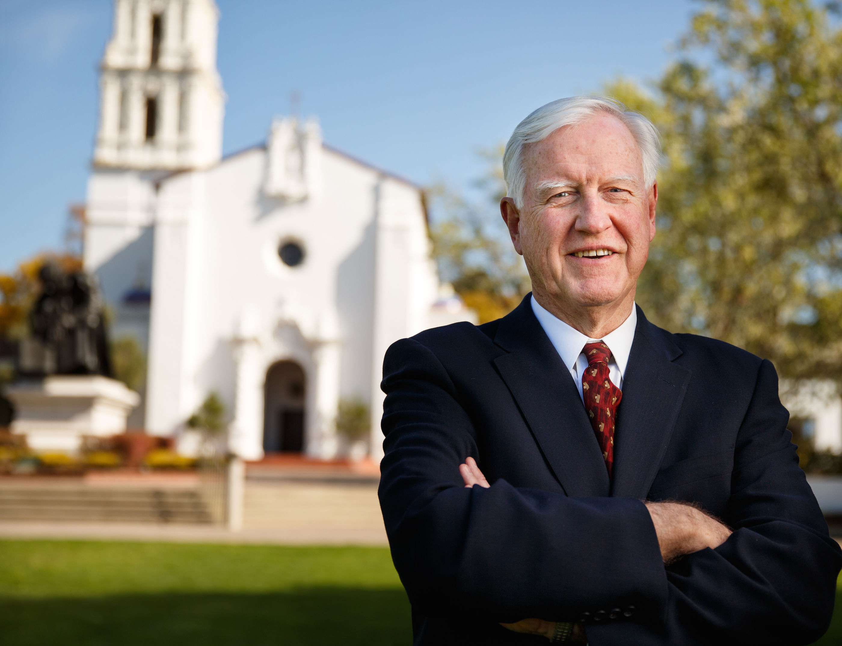 James Donahue in front of chapel