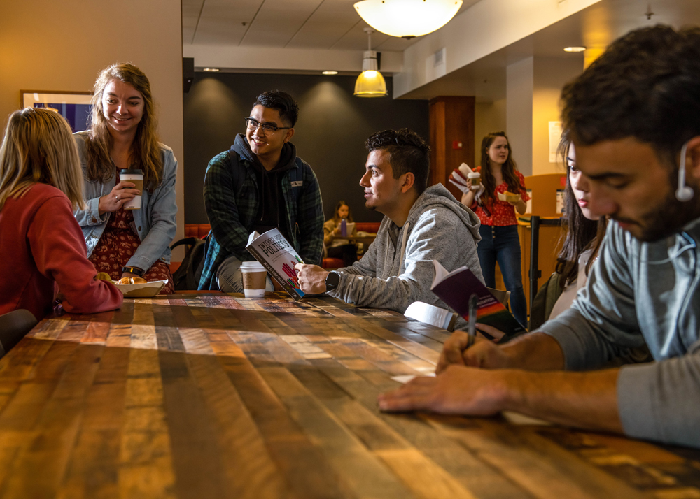 Students in a cafe on Saint Mary's College Campus talking