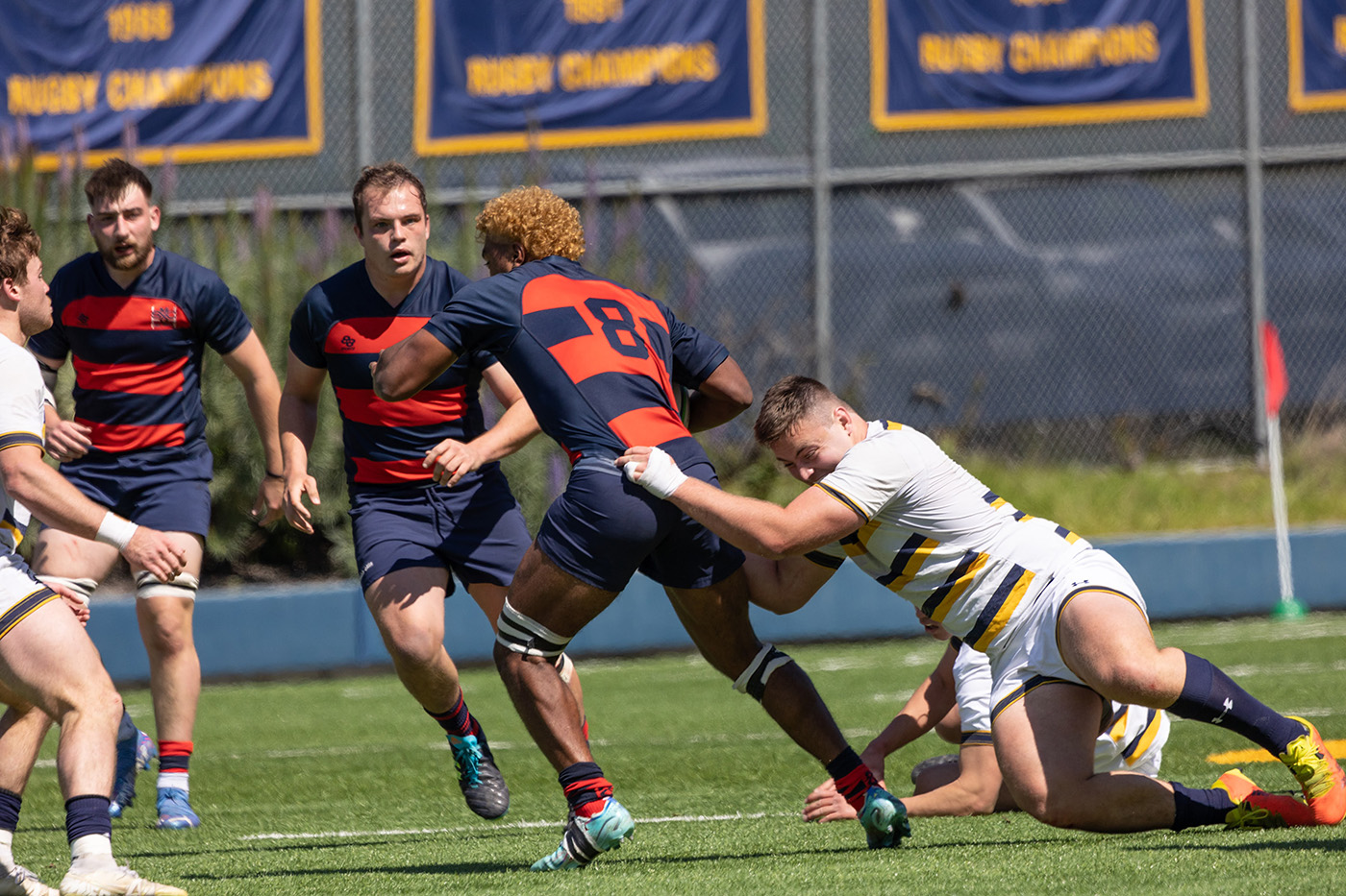 Saint Marys rugby players Kaipono Kayoshi, Josh Allan and Lleyton Delzell in the background against UC Berkeley March 25, 2023