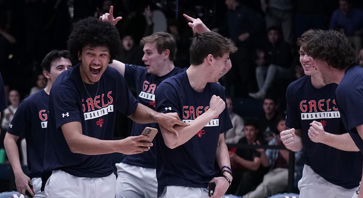 Men's basketball players celebrate on March 12 2023 as NCAA brackets are announced