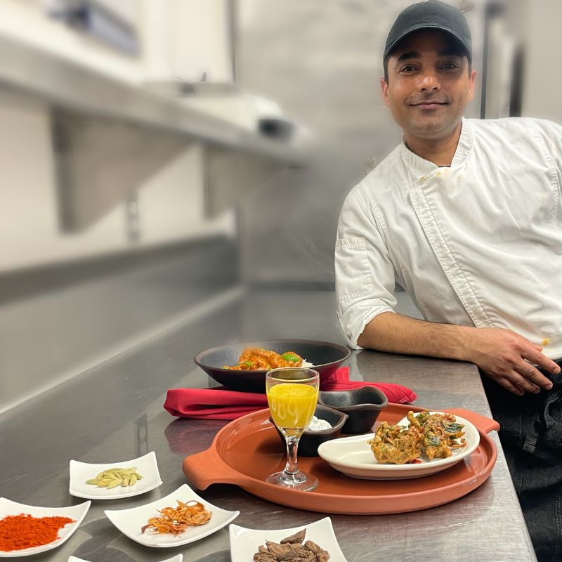 chef showcasing his dish
