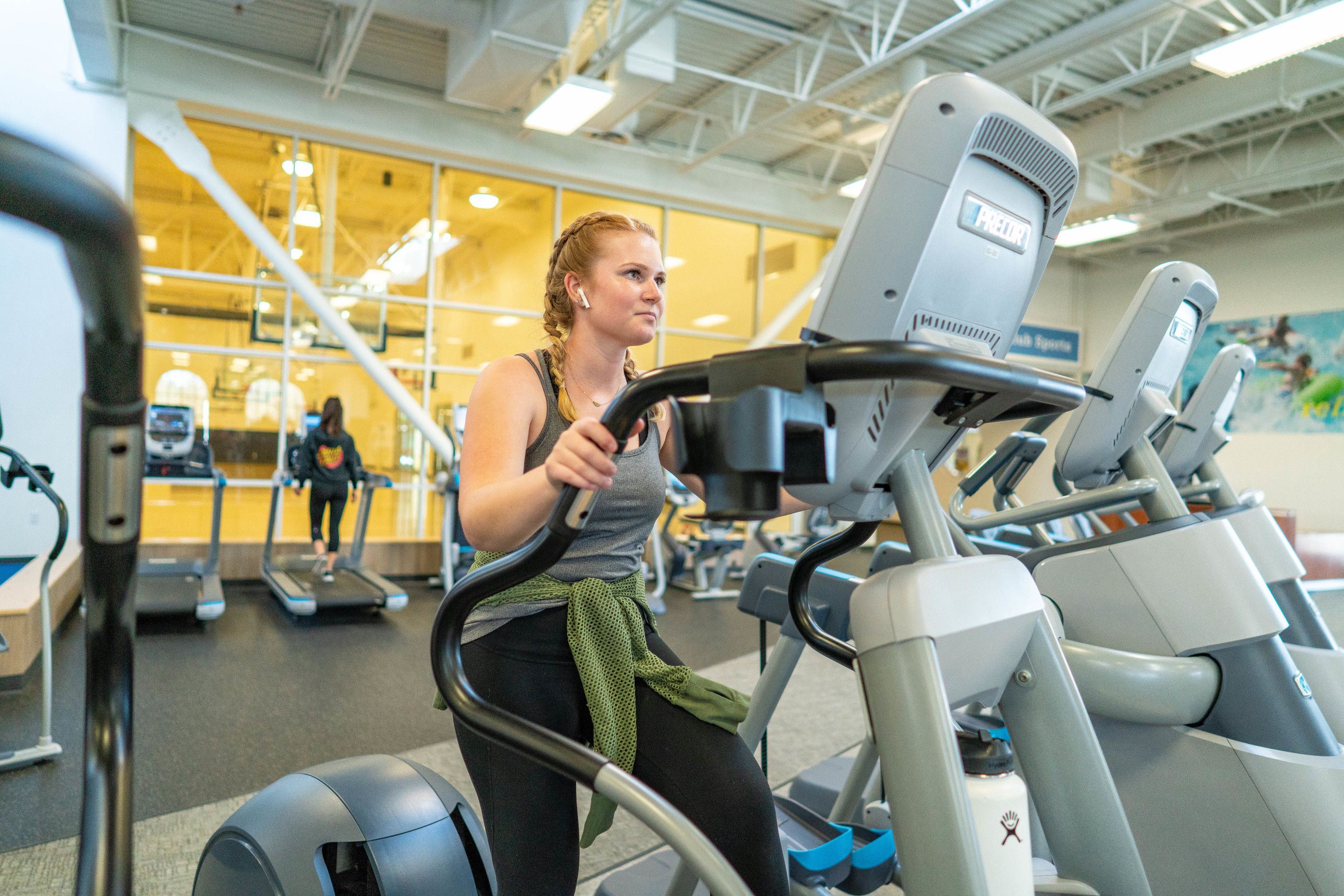 Student using cardio equipment at the rec center