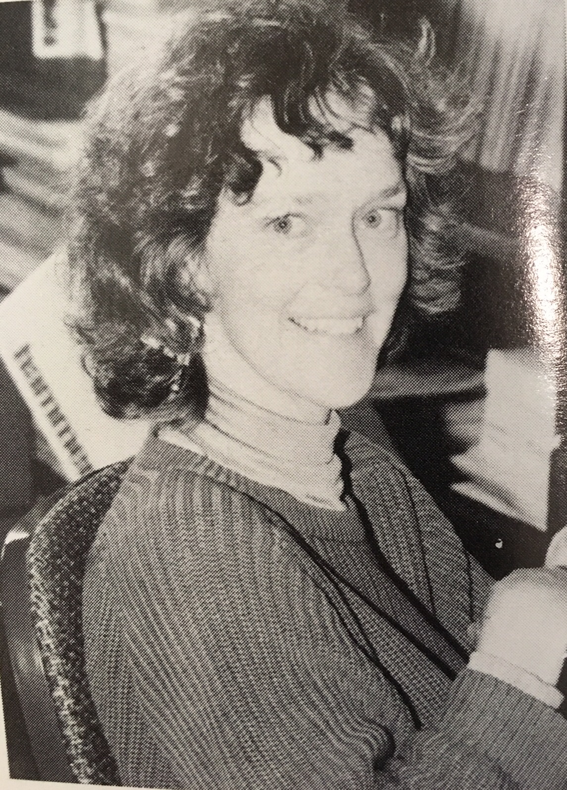 Headshot photo of Prof. Sandra Grayson at her desk