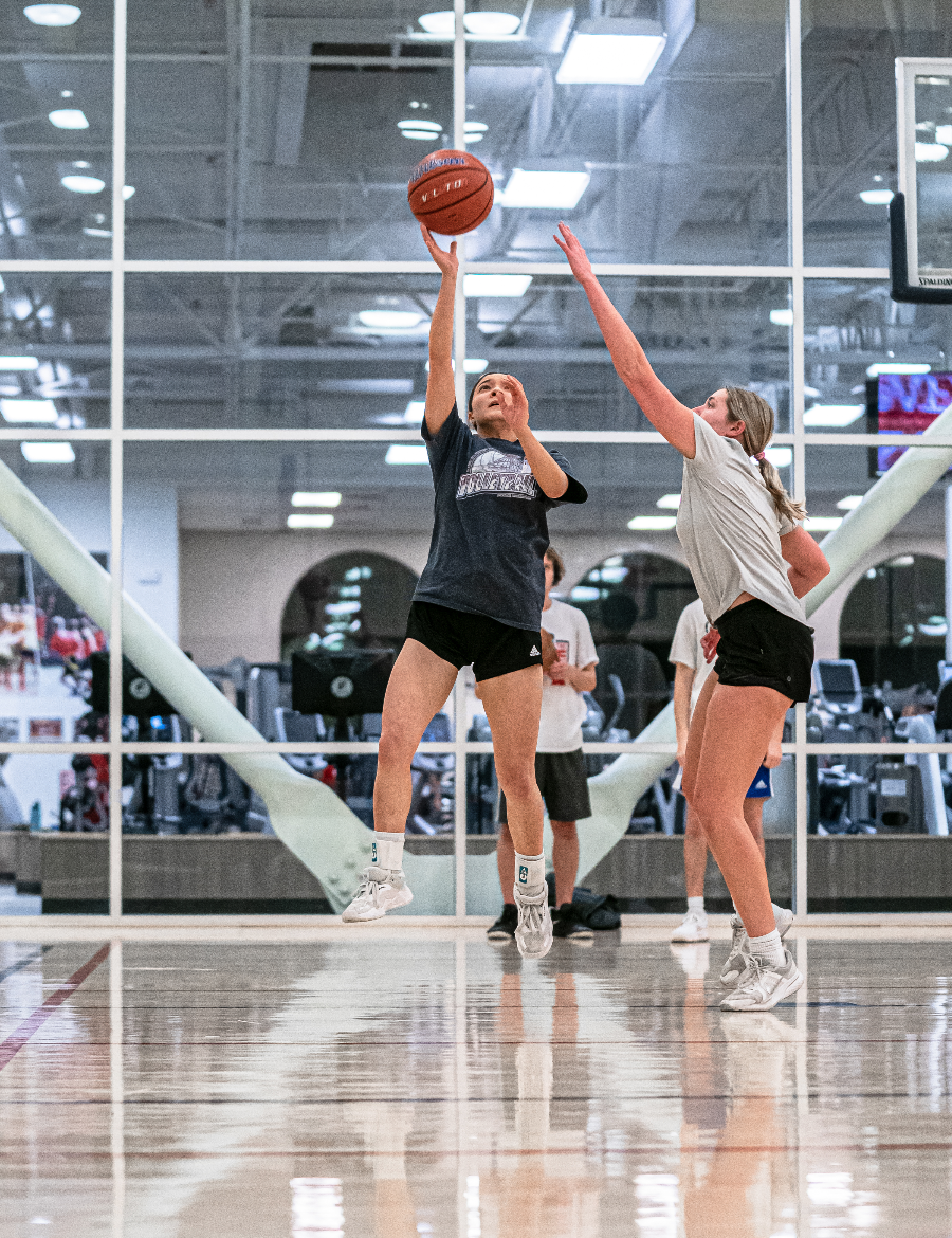 Students playing basketball