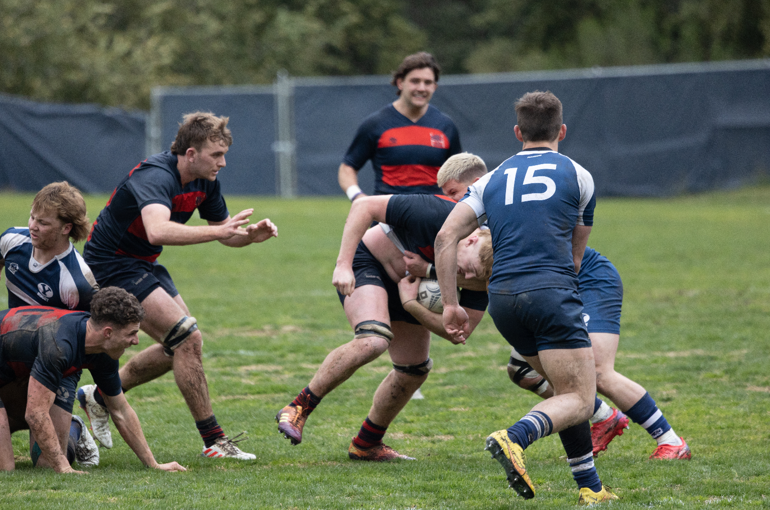 Ronnie McElligott fighting for yards against the BYU opponent