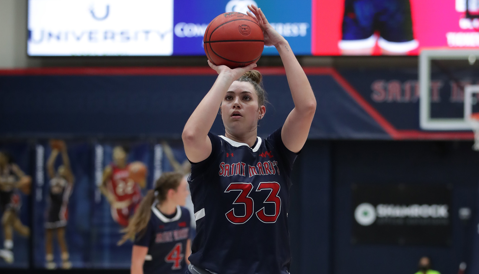 Women's basketball player Ali Bamberger shoots against Santa Barbara