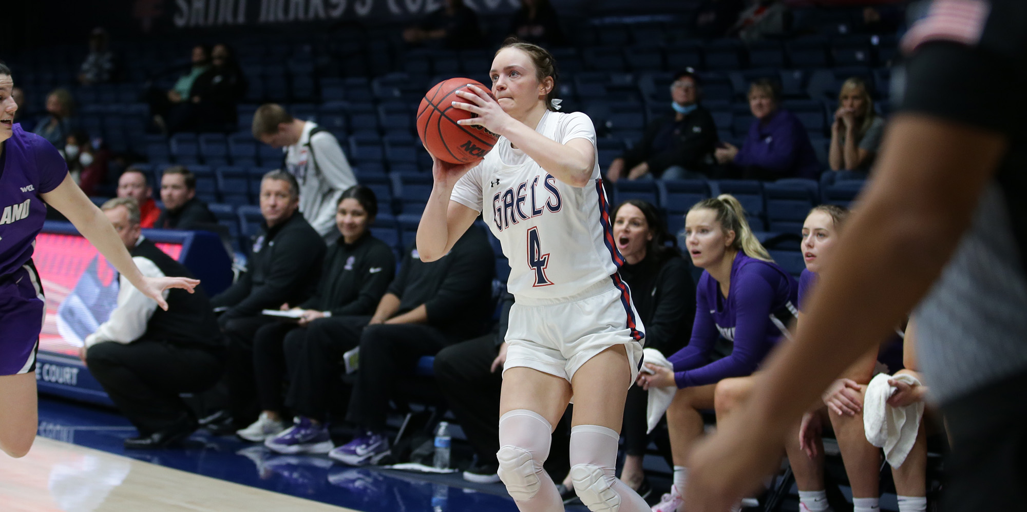Women's basketball player Taycee Wedin shoots a 3-pointer against Portland in February 2022