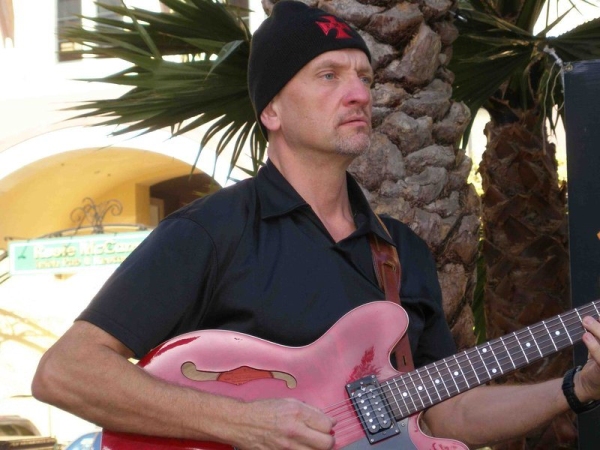 Jeff Massanari playing the guitar