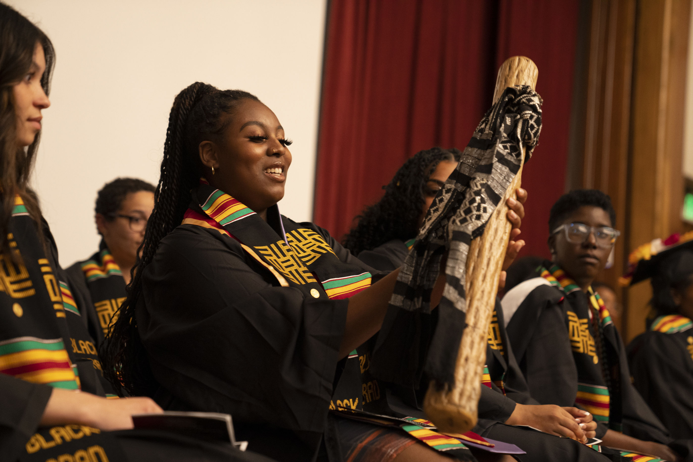 Students participating in the Rain Stick Tradition