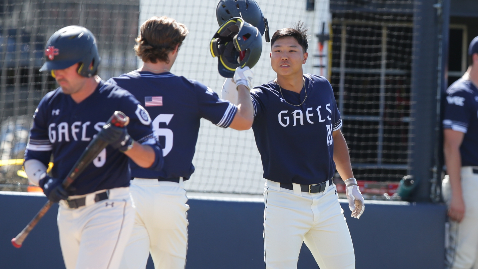 SMC Baseball players celebrate a home run
