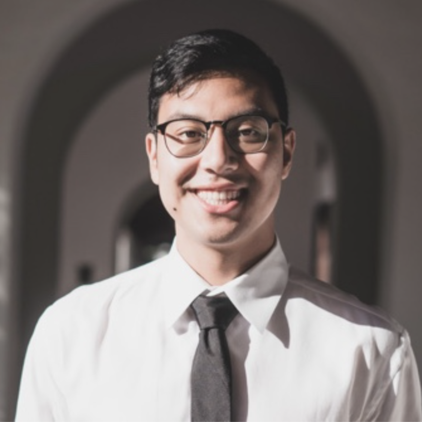 SMC alumni Alexander San smiling