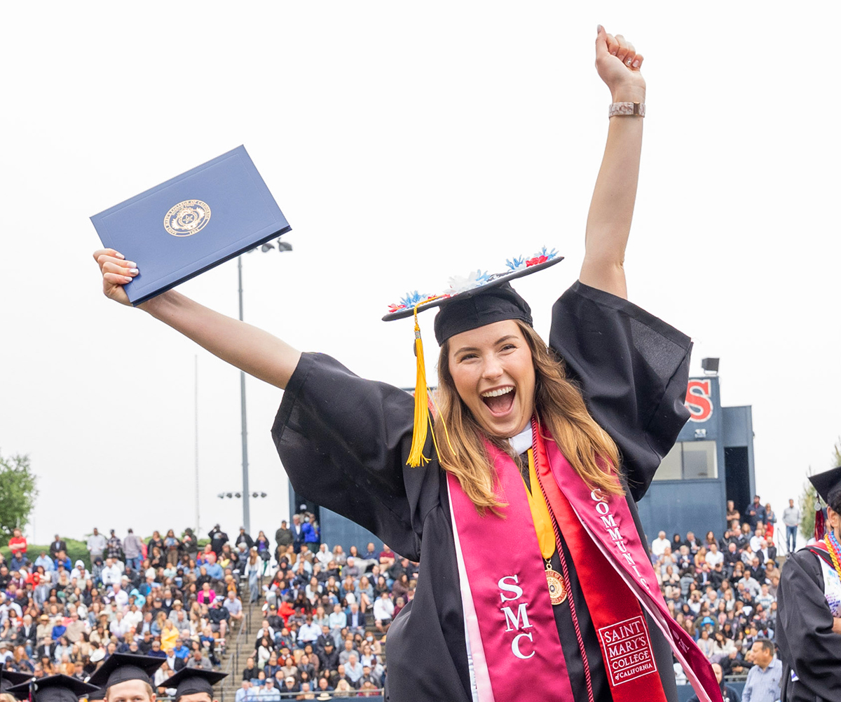 Saint Mary's student raising diploma to celebrate at commencement 2023