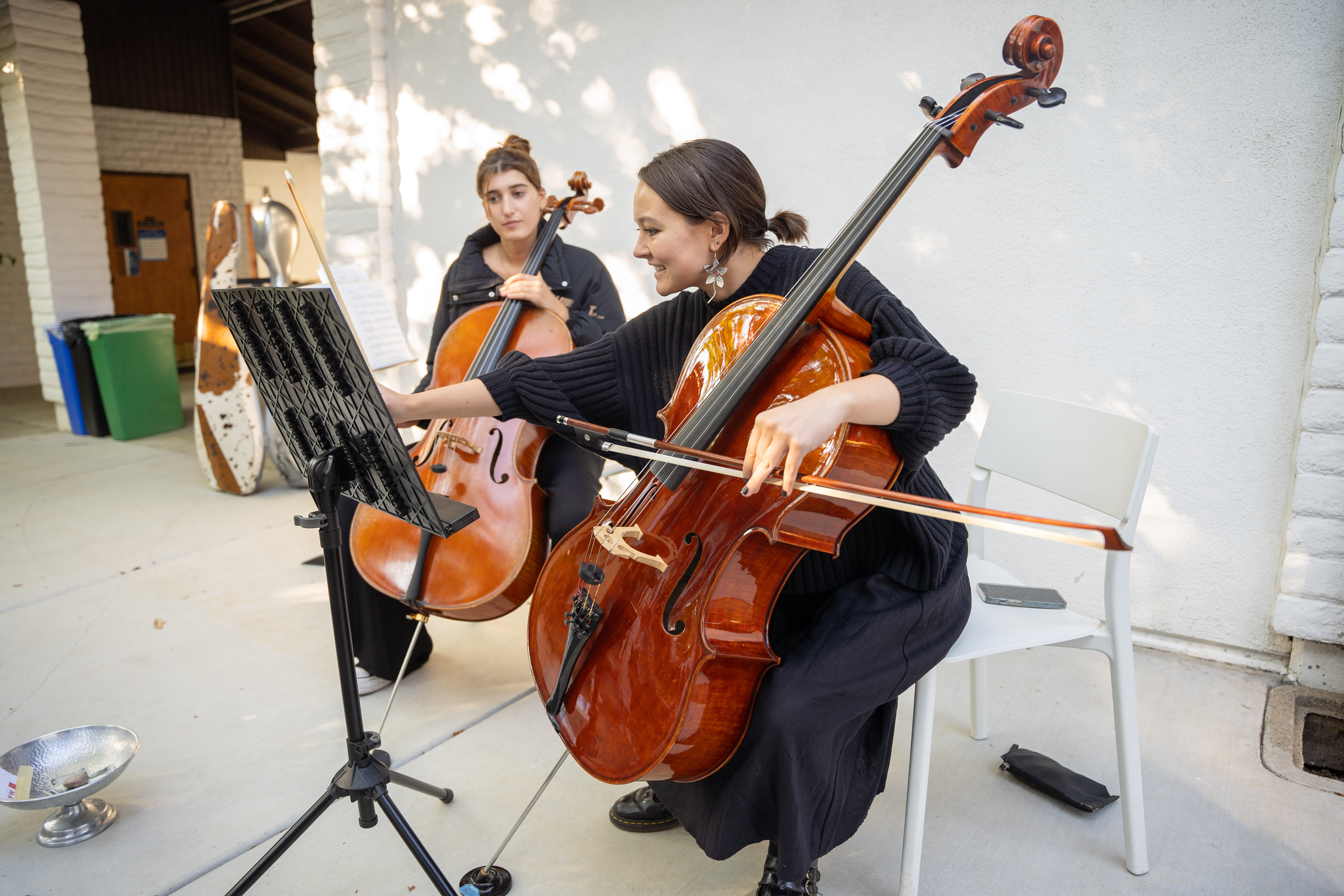 Desiree Sturrock and another cellist playing in the Museum of Art