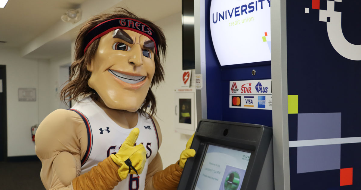 Gideon the mascot at the University Credit Union ATM