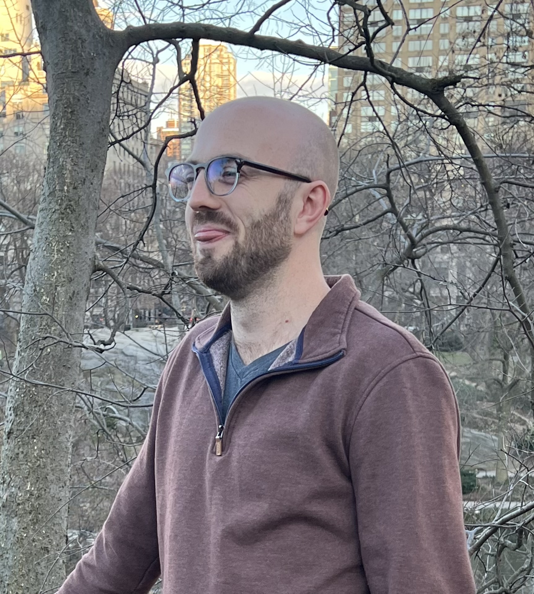 Mitchell White at Central Park, staring off into the distance