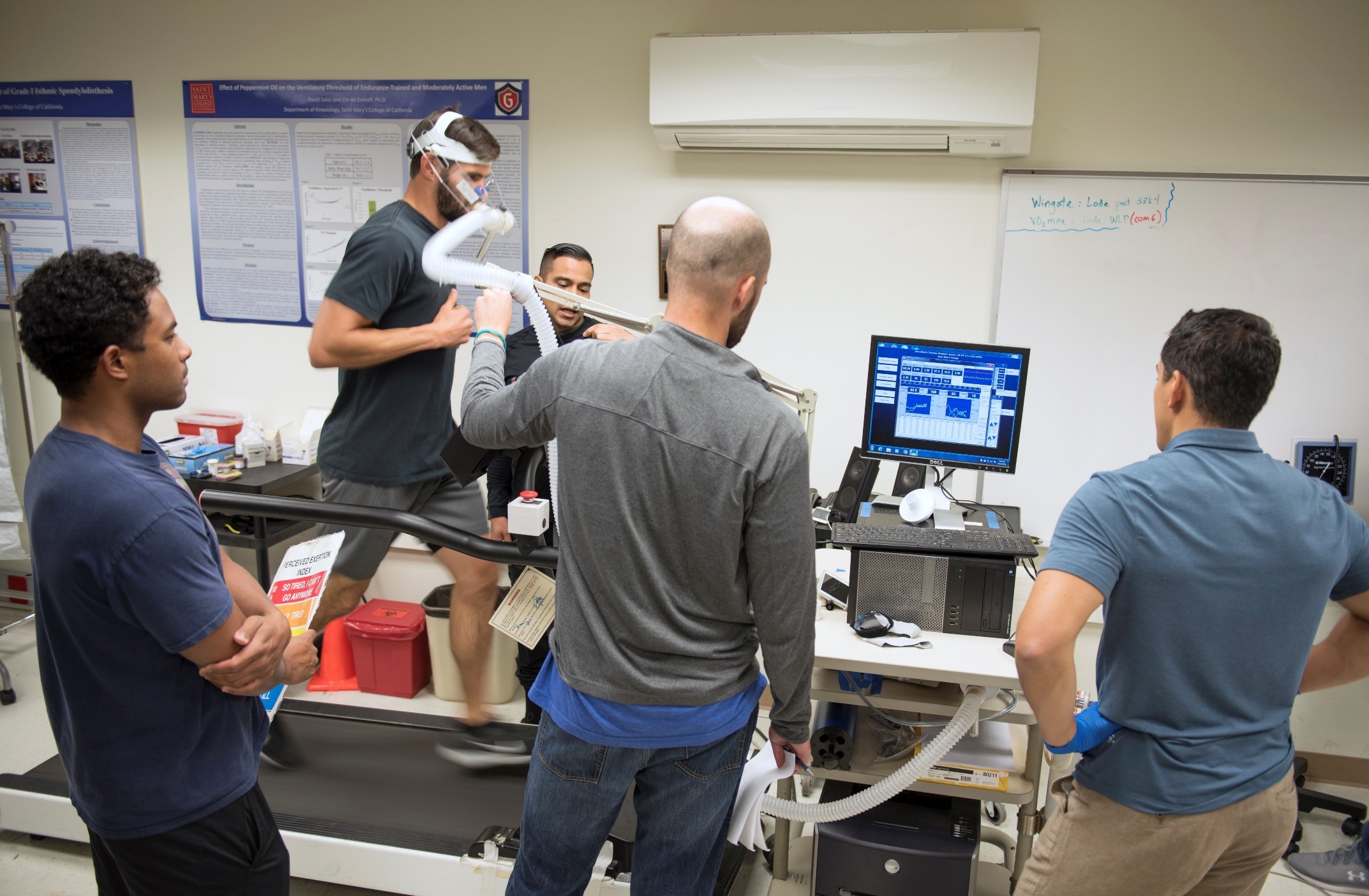 Five Saint Mary's Kinesiology students in the Human Performance Lab.