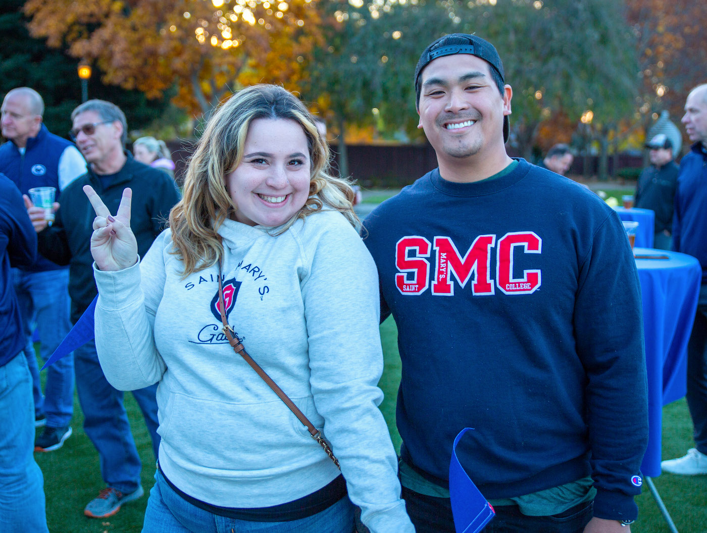 A couple smiles during the Homecoming 2022 FanFest