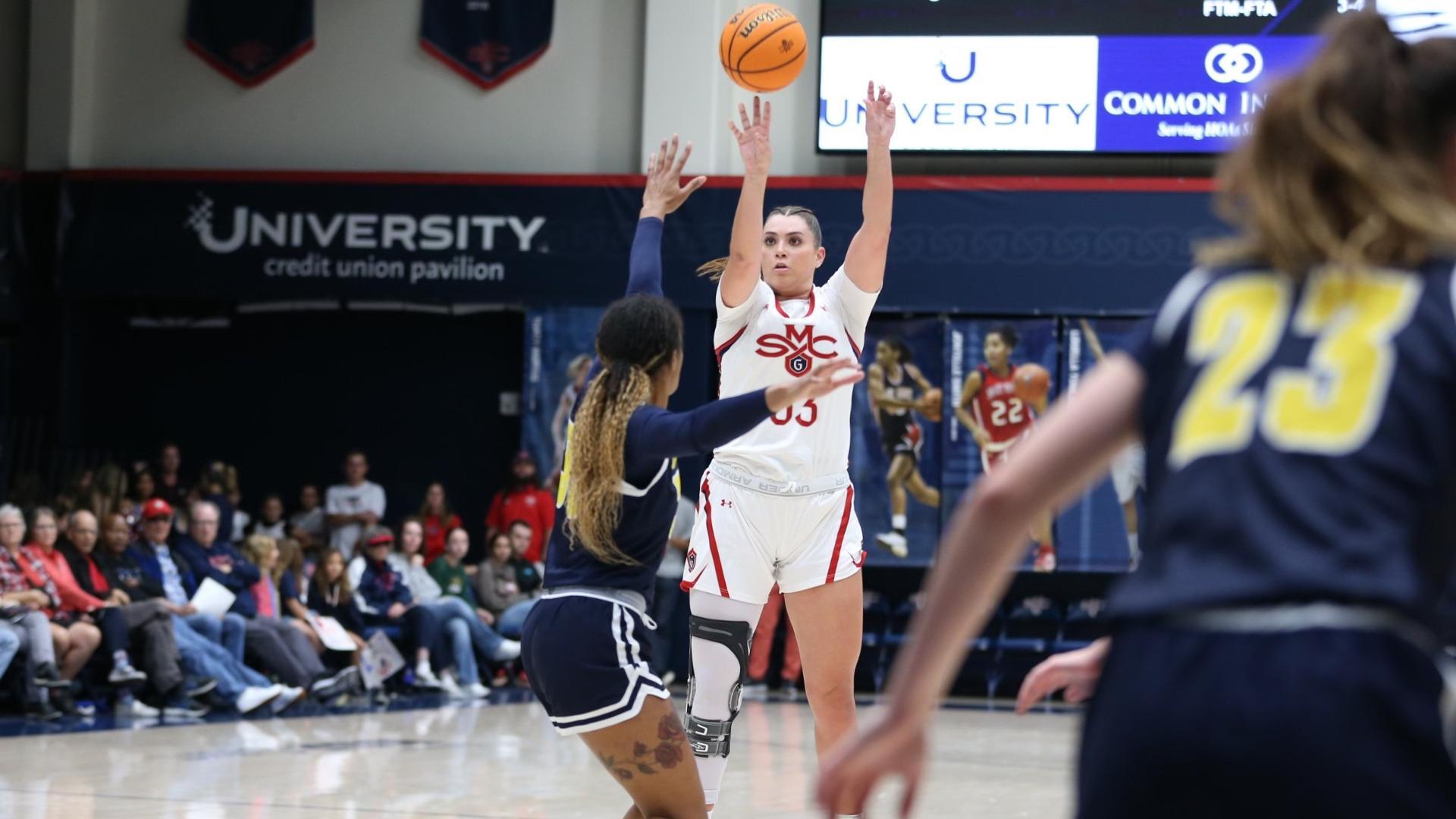 Women's basketball player Ali Bamberger shoots against UC San Diego on November 12, 2023