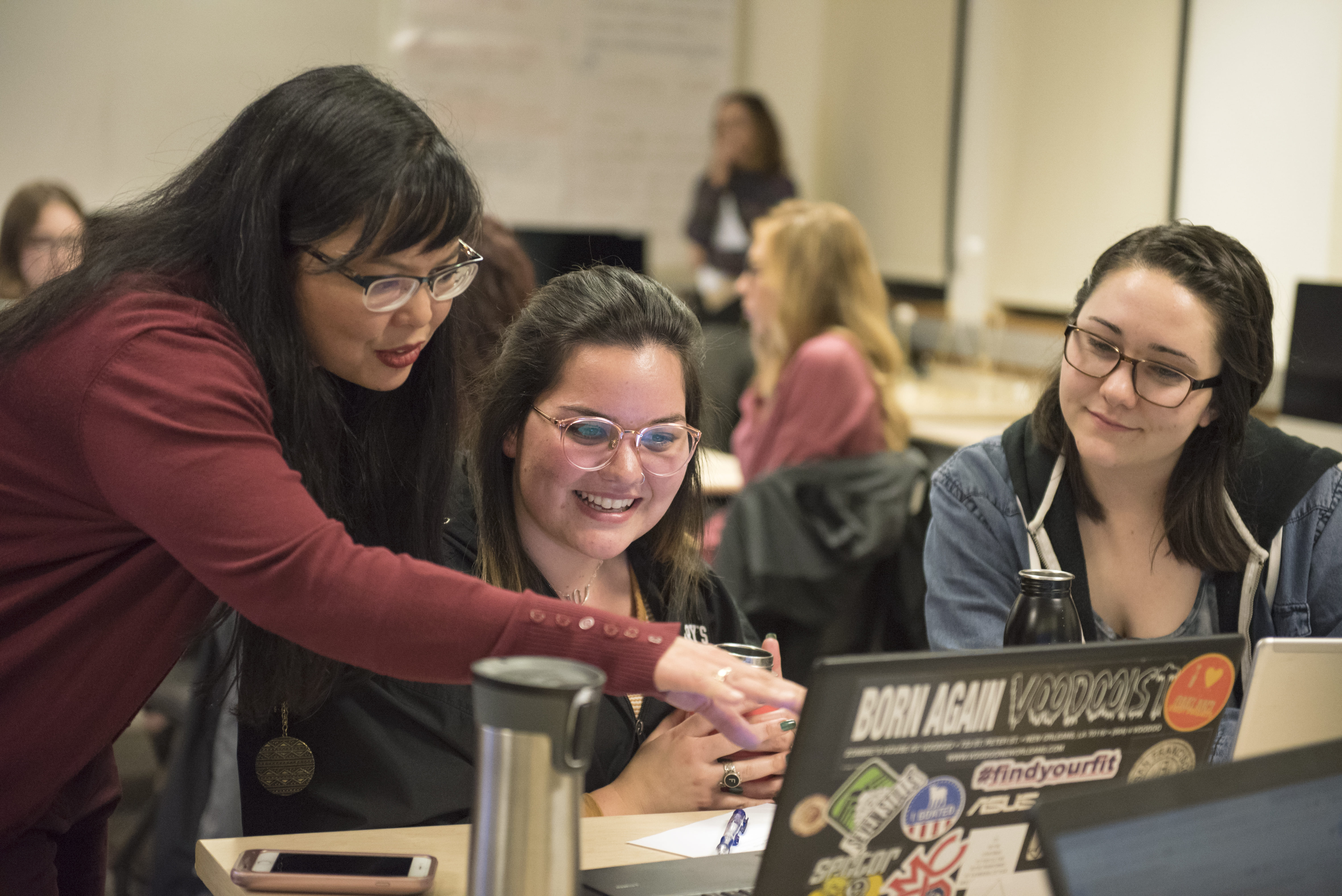 Teacher and students in an SMC classroom