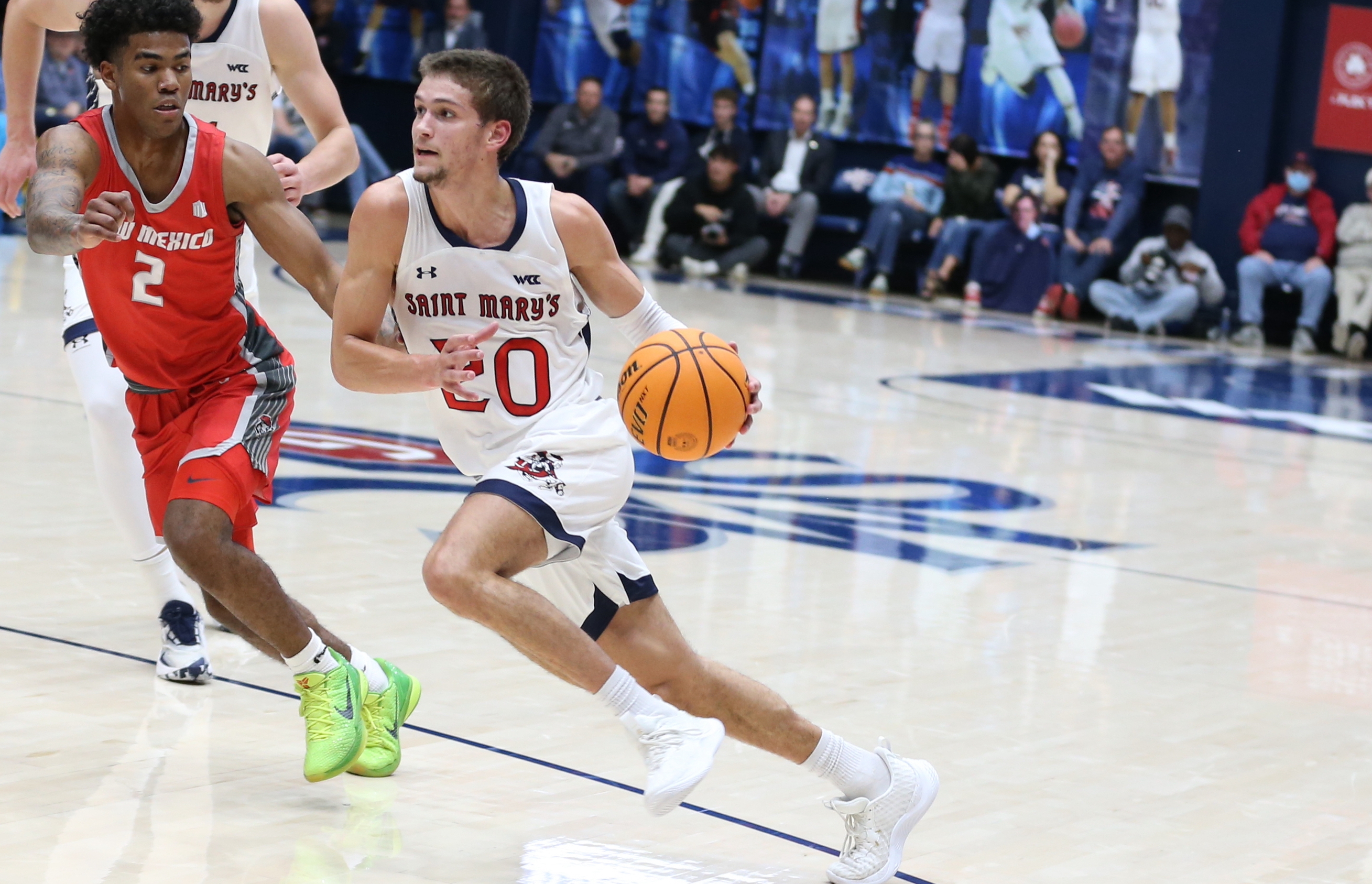 Aidan Mahaney driving up the court
