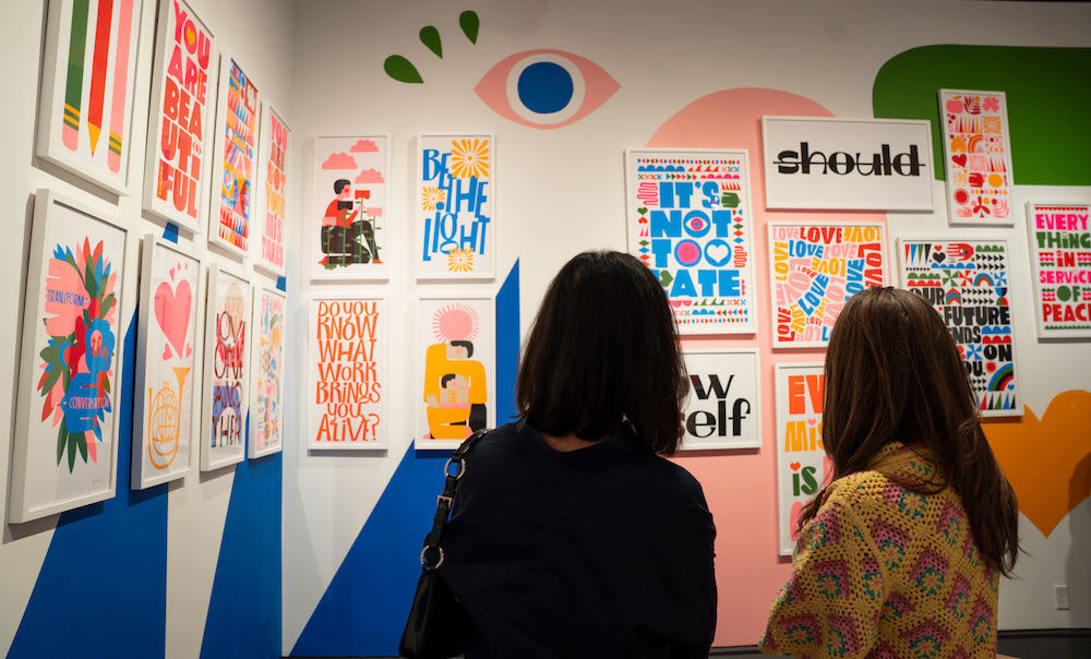 Visitors looking at exhibit of Lisa Congdon's "Hold It Lightly" at the SMC Museum of Art, October 2023