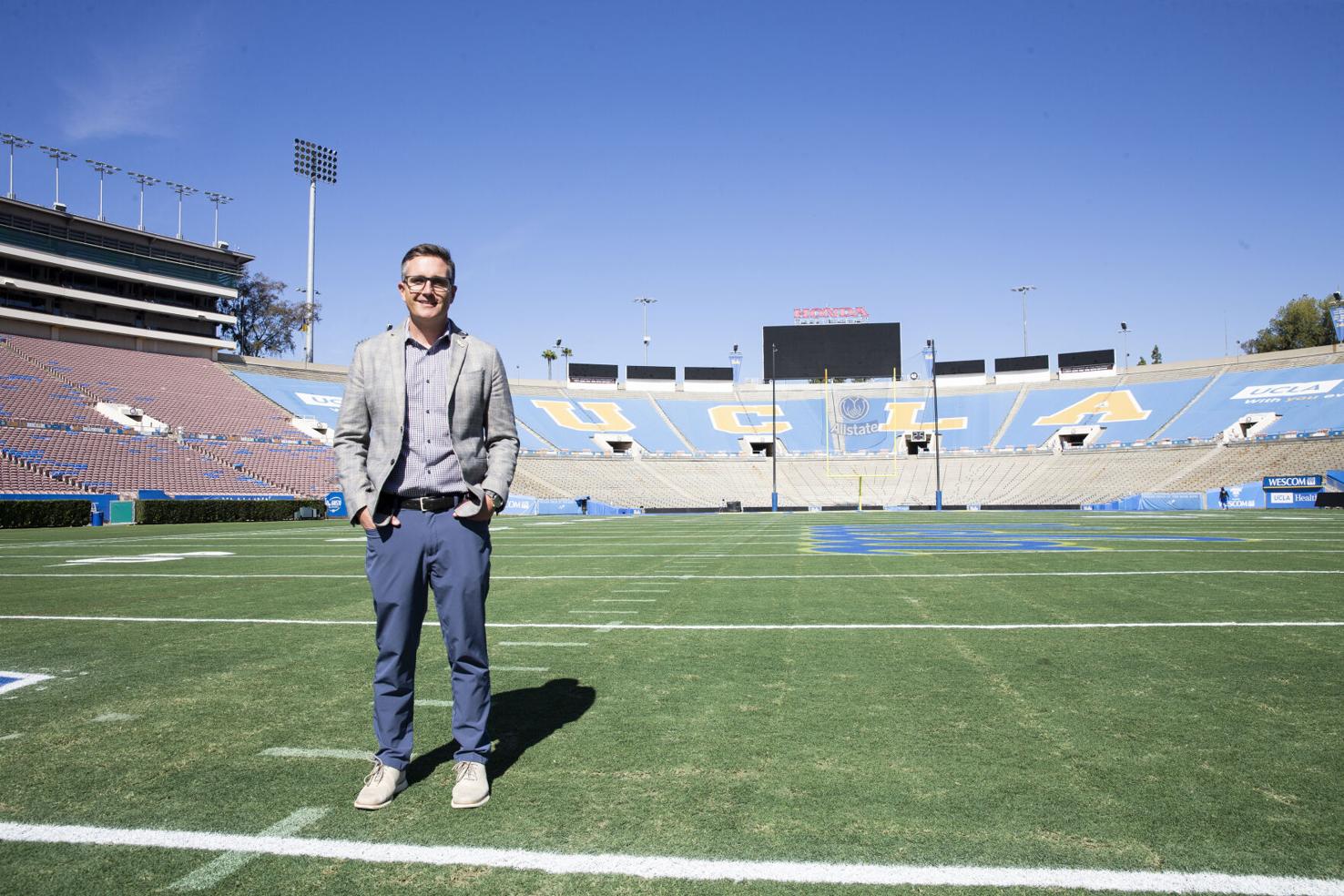Jens Weiden stands on the field at the Rose Bowl