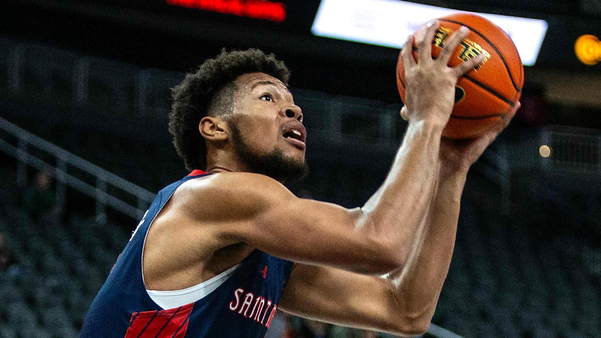 Men's Basketball player Joshua Jefferson shoots against Portland in February 2024