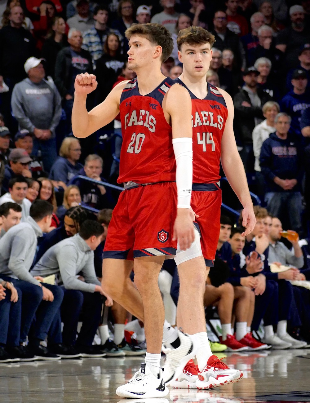 Men's basketball players Aidan Mahaney and Alex Ducas celebrate against Gonzaga on February 3, 2024