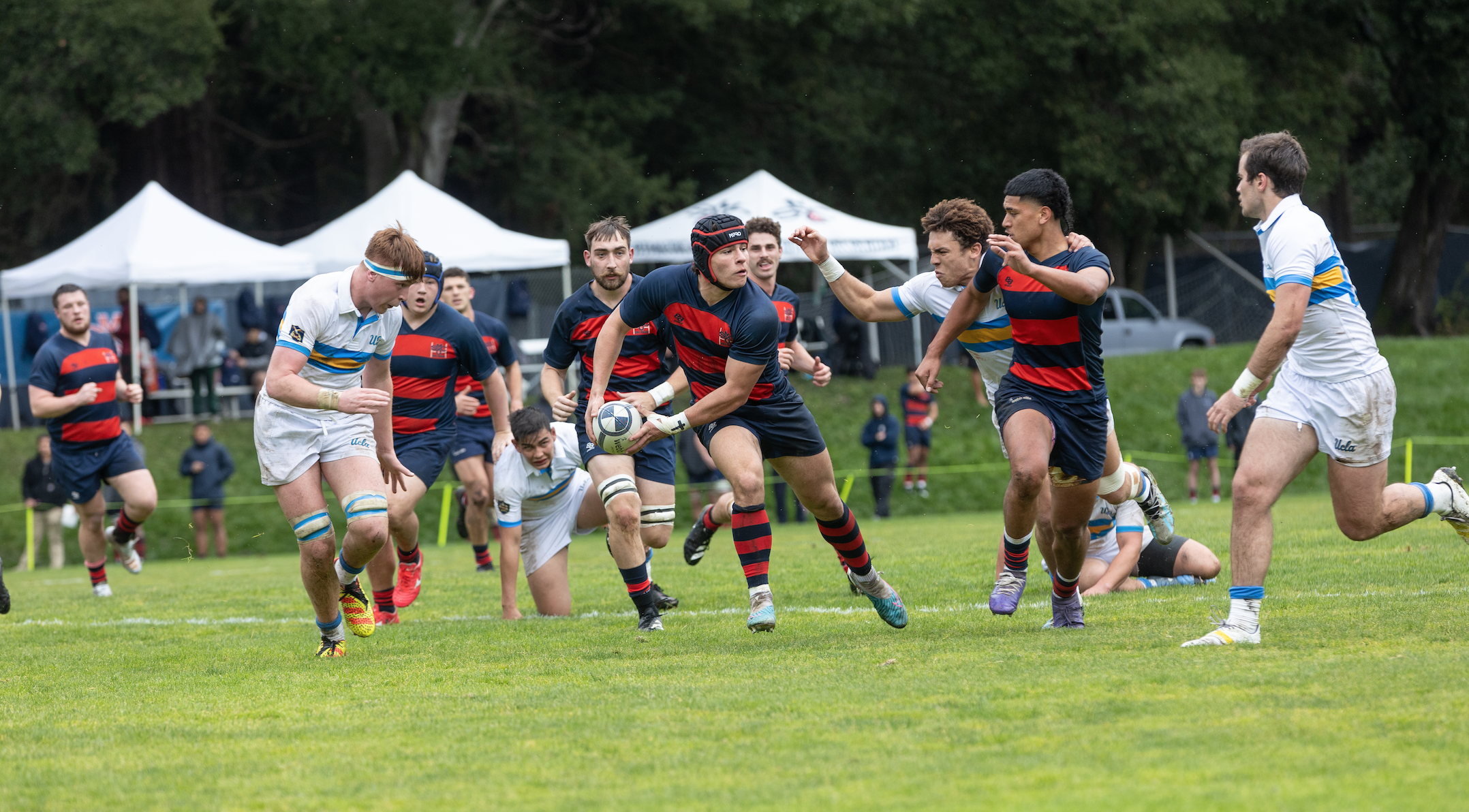 Dominic Besag looks to pass th rugby ball