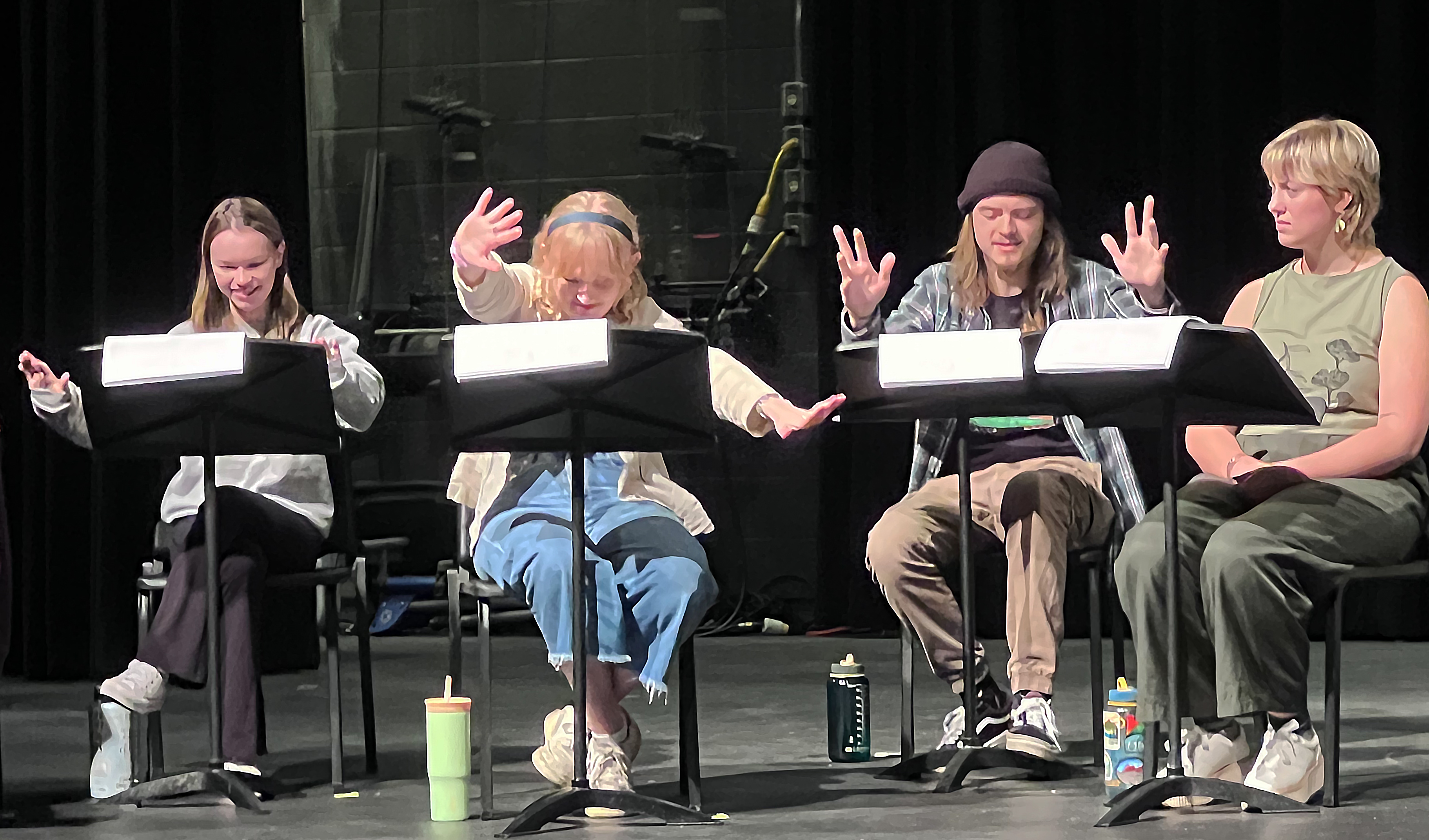 The Trials students reading in LeFevre Theatre
