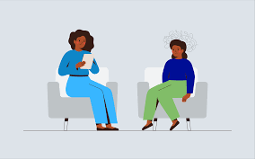Picture of 2 people sitting on chairs talking, one person has a notepad and the other has swirly lines above head indicating distress