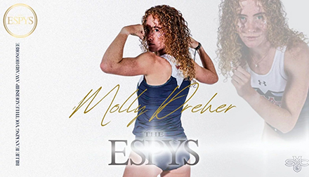 athlete showing guns