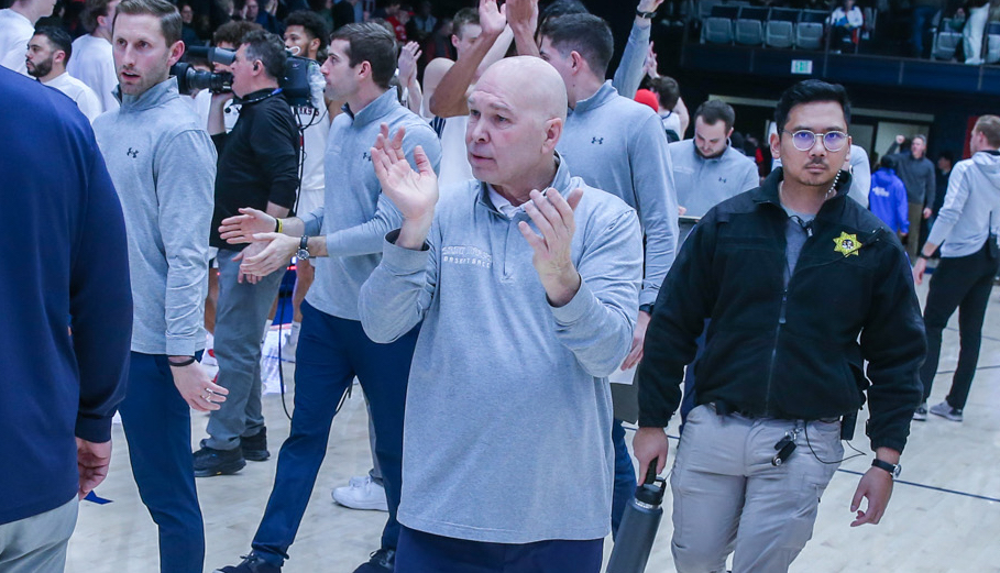 Saint Mary's Men's Basketball Head Coach Randy Bennett celebrating after a game