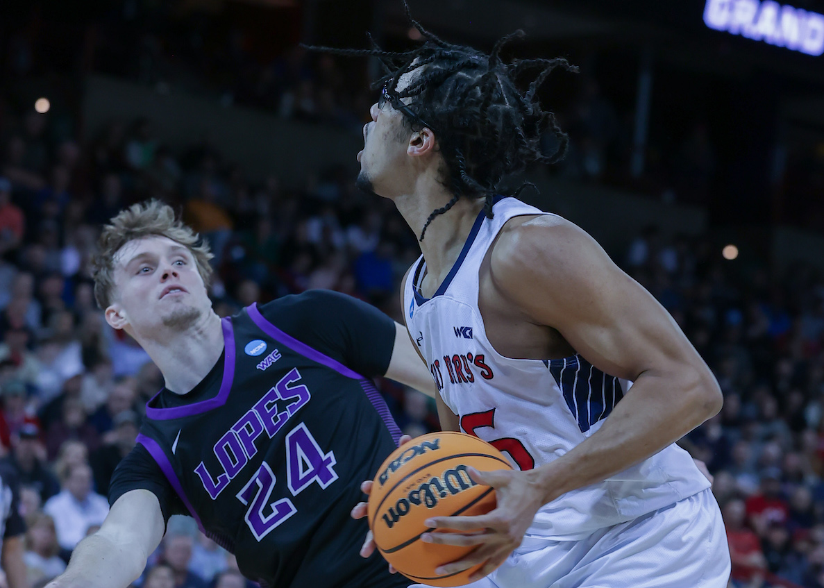 Men's basketball player Mason Forbes prepares to shoot against GCU in 2024 NCAA Tournament