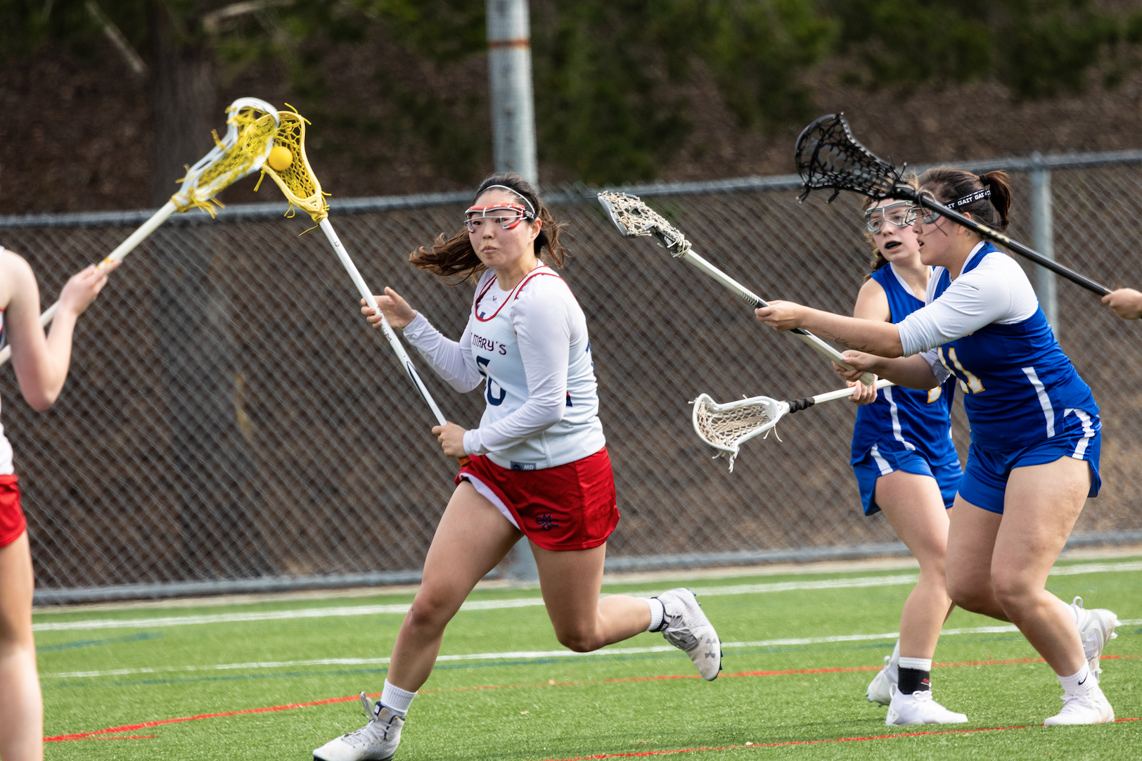 No. 16 Haeme Chee ‘24 sweeps past the defender during the game against San Jose State on Saturday, March 9