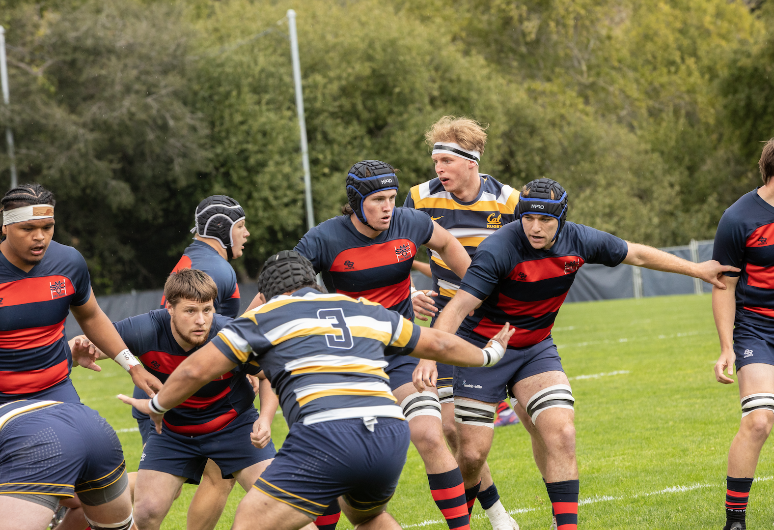 Pictured from left to right, King Matu ‘24, Hunter Chuhlantseff ‘24 MA, Matthew Abbes ‘26 and Cathal Coakley ‘24 are ready to attack while UC Berkeley attempt to pass the ball. / Photo by Rebecca Harper