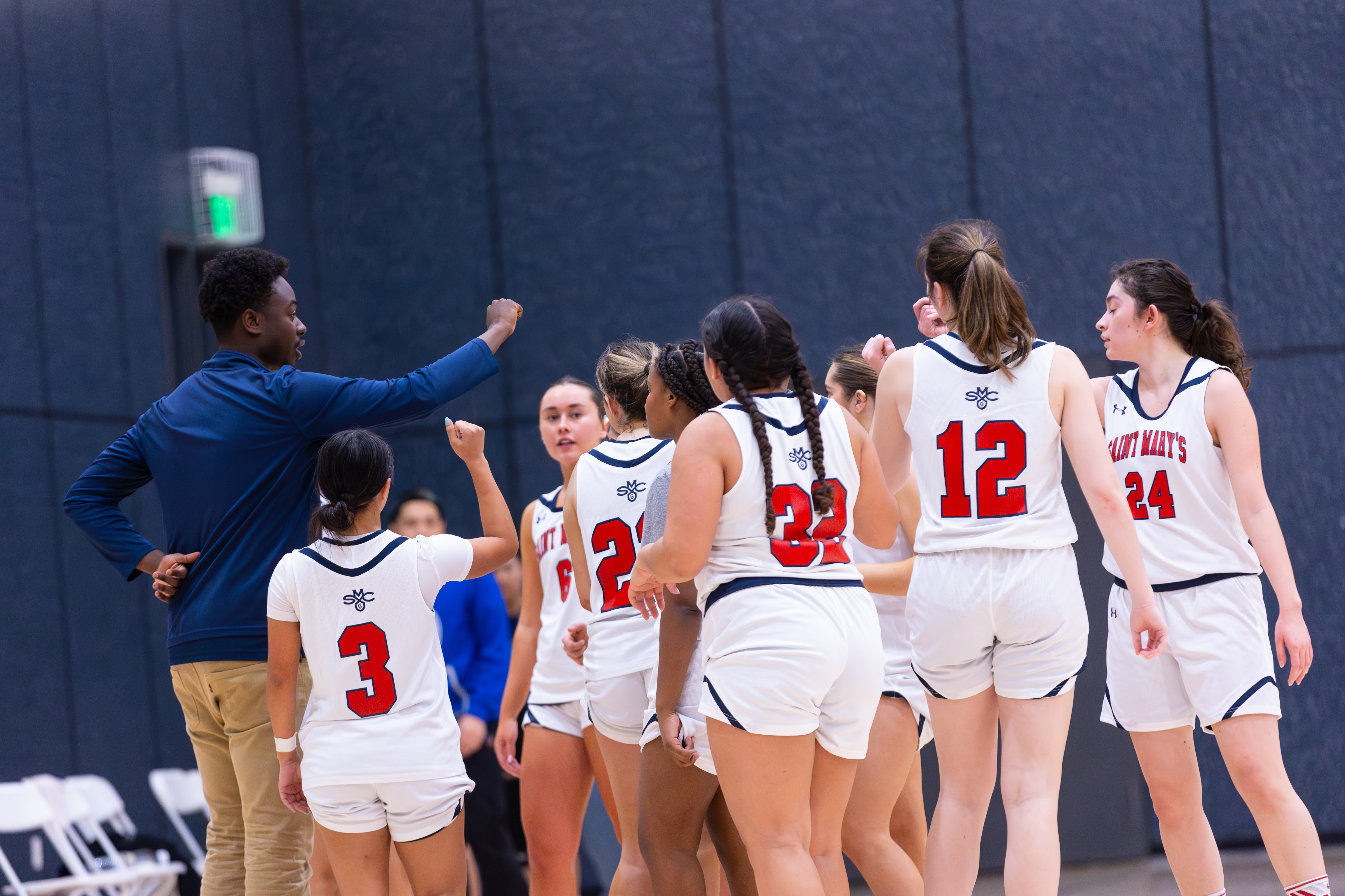 The newly established Women's Club Basketball team gathers together for an after game cheer at the Joseph L. Alioto Recreation Center on Feb 17, 2024 / Photo by Rebecca Harper