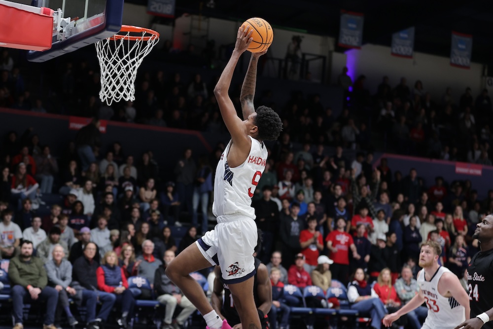Men's Basketball player Ashton Hardaway scores a basket against Stanislaus State in November 2024