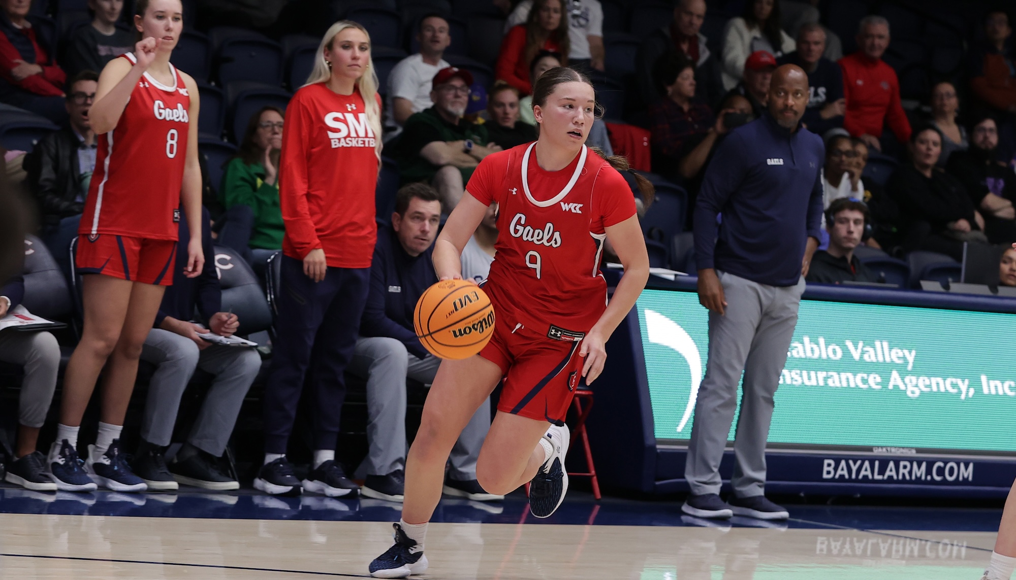 Women's Basketball player Maia Jones drives against Denver in November 2024